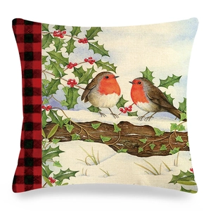 Winter linen pillowcase featuring robins on snowy branches with red plaid detail