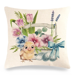 Detail of linen Easter pillow cover with watercolor chick, eggs and spring flowers