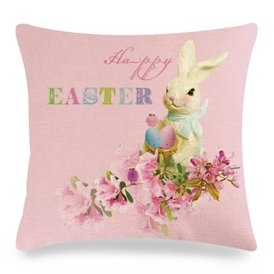 Detail of linen Easter pillow cover showing bunny print and Happy Easter text