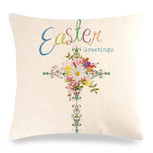 Close-up of Easter greetings text with floral cross on linen pillowcase texture