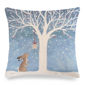 Detailed macro view of the linen texture and festive rabbit winter illustration on cushion cover