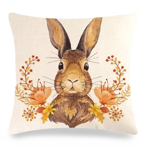 Detail view of the linen pillowcase fabric with a watercolor bunny and floral print