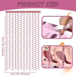 Detail of pink foil fringe curtain with unique tadpole shape and adhesive backing strip