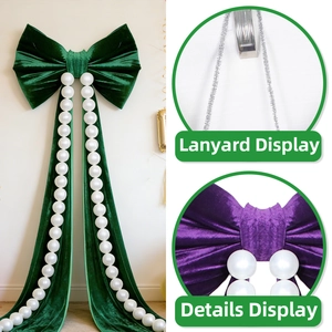 Giant velvet holiday bow ornaments in green and purple with white pearl bead chains