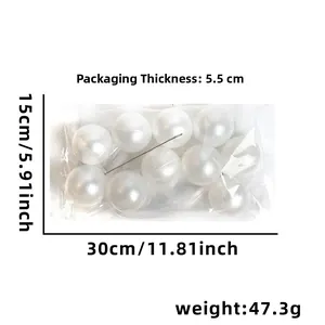 Detailed view of white faux pearl decorative strands with packaging and size specifications