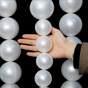 Detail of white decorative pearls with CE certification mark for DIY wedding backdrop