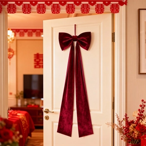 Elegant large burgundy velvet bow hanging decoration for wedding room and festive party venue