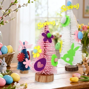 Three Easter sisal trees with pastel eggs and felt bunny decorations on wood bases