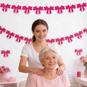 Hot pink bow banner for Mother's Day party decorations in a cozy home setting