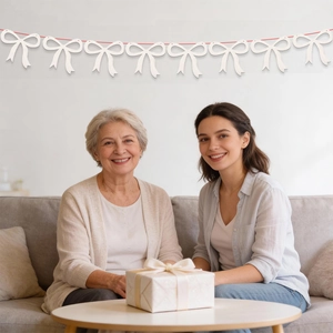 Mother's Day decoration with white bow banner and red string for festive party home decor