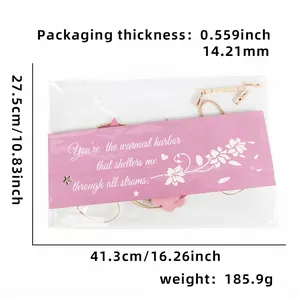 Detailed view of DIY photo hanging kit with dimensions and weight in plastic packaging
