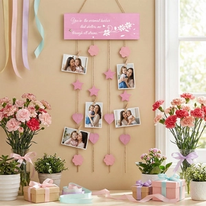 Pink wooden Mother's Day photo hanging board with heartwarming quote and floral decor