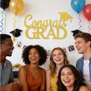Glittery gold Congrats GRAD letter sign with mortarboard for graduation party wall decor