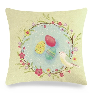 Detail of Happy Easter linen pillowcase with colorful eggs and bird floral wreath