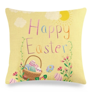 Detail of linen Easter pillow cover with colorful Happy Easter print and flower basket
