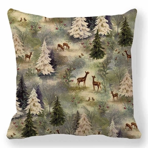 Detailed close-up of linen pillow cover featuring vintage reindeer and forest patterns