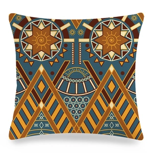 Detail of geometric ethnic pattern on textured linen cushion cover with warm earth tones