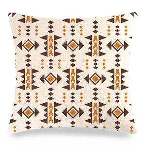 Macro detail of geometric tribal pattern on textured linen cotton pillow cover