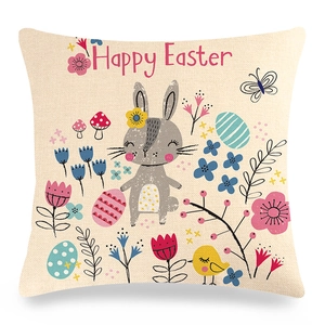 Gros plan sur une taie d'oreiller en lin Happy Easter avec lapin et œufs colorés