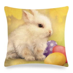 Détail de la texture en lin montrant un lapin de Pâques blanc et des œufs sur une housse