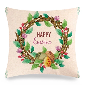 Detail of linen Easter pillowcase featuring a watercolor floral wreath and Happy Easter text