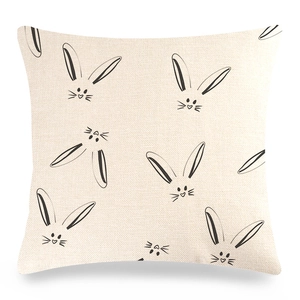 Detailed texture of linen Easter bunny pillowcase with black minimalist rabbit outlines