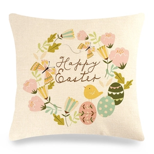 Detail of Happy Easter linen pillowcase with hand-painted floral wreath and colorful eggs