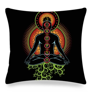 Detailed view of black linen pillowcase with seven colorful chakra symbols and mandala print