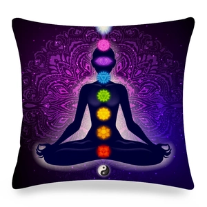 Detail of linen pillowcase with colorful seven chakras and mandala flower pattern