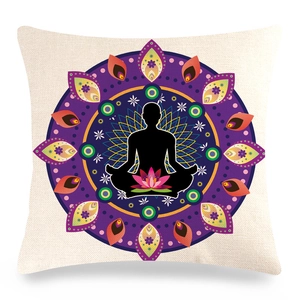 Close-up of linen pillowcase with mandala print, yoga silhouette and lotus detail