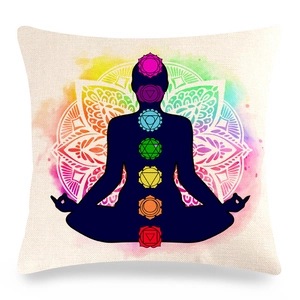 Close-up of textured linen pillowcase with watercolor mandala and seven chakra symbols