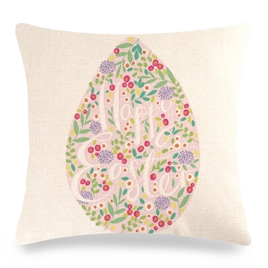 Linen Easter pillow cover with pink floral egg pattern and Happy Easter typography