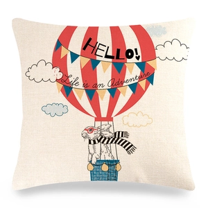 Detailed texture of linen cushion cover with cartoon rabbit and hot air balloon print