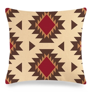 Close-up of geometric linen pillowcase texture with ethnic aztec patterns and beige fabric