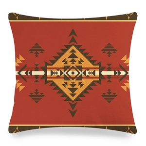 Detail of linen cushion cover with tribal geometric patterns and textured fabric finish