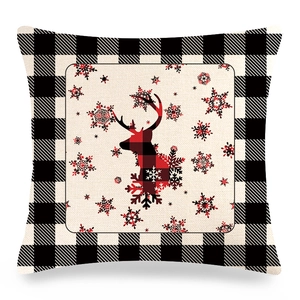 Detailed texture of Christmas linen pillowcase with buffalo plaid reindeer silhouette