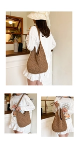 Close-up of brown straw woven shoulder bag with diamond hollow pattern in a cafe setting