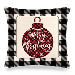 Detail view of linen Christmas pillowcase with buffalo plaid pattern and Merry Christmas text