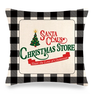 Detailed texture of Christmas buffalo plaid pillowcase with Santa Claus festive print