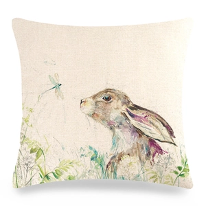 Detailed texture of linen pillowcase with watercolor rabbit and dragonfly illustration