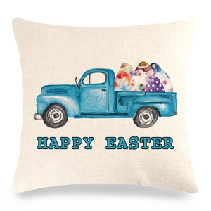 Detail of linen Easter pillowcase featuring a watercolor blue truck with colorful eggs