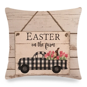 Detail of linen Easter pillow cover showing vintage pickup truck and tulips print