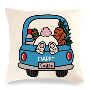 Close-up of linen pillowcase with blue Easter car print, colorful eggs and bunny tail