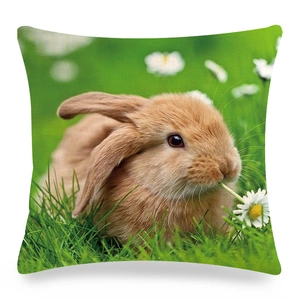 Detailed view of linen pillowcase with realistic bunny and green grass print