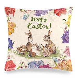 Detail of linen Easter pillowcase featuring watercolor rabbits and tulips with festive text