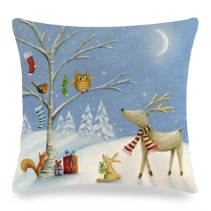 Detail of linen Easter pillowcase featuring festive cartoon animals and floral prints