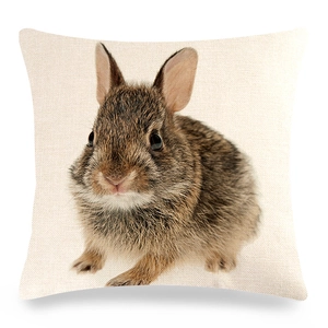 Detailed texture of linen Easter pillow cover featuring a realistic brown rabbit print