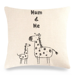 Detail of linen pillow cover with Mum and Me giraffe print on white background