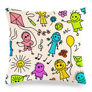 Close-up of linen pillowcase featuring colorful hand-drawn children graffiti and sun