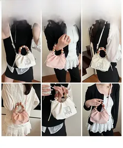 Mini canvas drawstring bucket bag with amber beaded handle and cute bear print